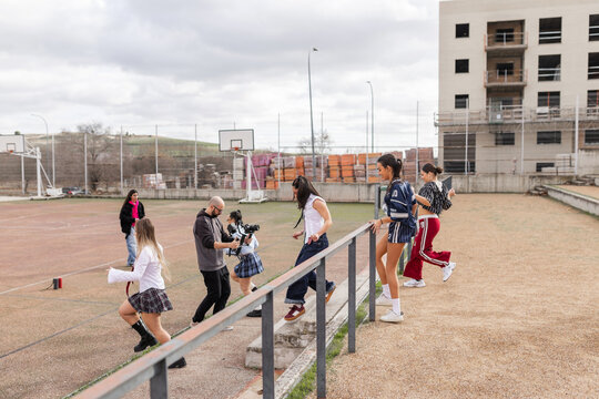 Behind the scenes filming students dancing in school stands