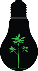 Green plant growing inside a black lightbulb silhouette symbolizing eco-friendly energy and growth