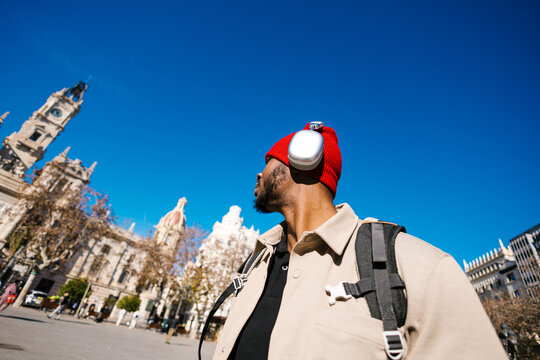 Man exploring Valencia's Town Hall Square