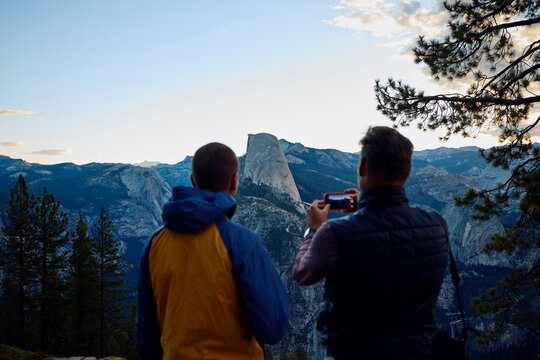 Friends capture photos of a half dome