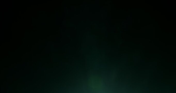 Slow motion cinematic lens flare and light leak effect isolated on black background. Perfect overlay for VFX, transitions, title reveals, film burn style and glow highlights.