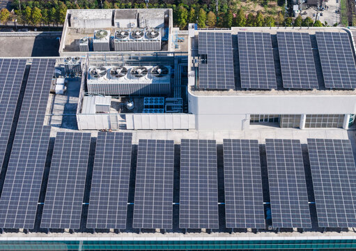 Aerial View of Commercial Rooftop Solar Panel Installation