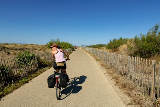 Cyclist Turning on Bike Path