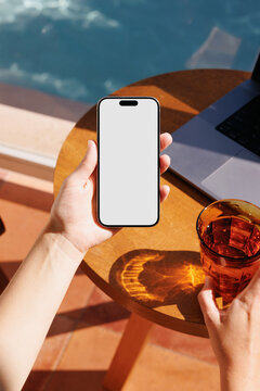 Hotel Summer Mockup Hands Holding Smartphone and Drink by Pool
