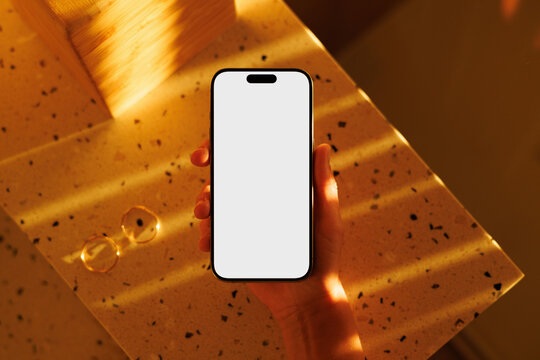 smartphone mockup with white screen in warm bathroom