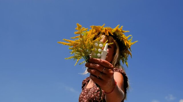 A woman is allergic to ragweed. Selective focus.
