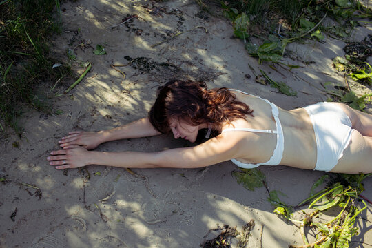 young woman on the sand