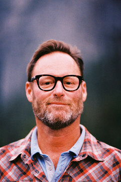 Man smiles in close up