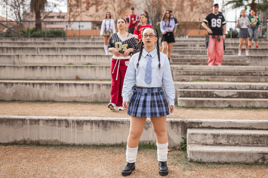 Group of students standing on school bleachers