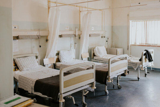 Empty hospital room with multiple patient beds
