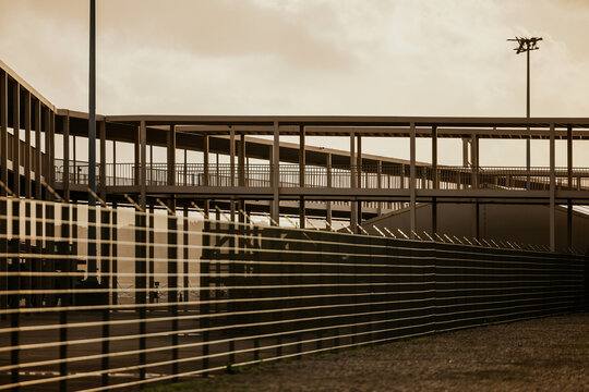 Elevated walkway under a hazy sky in urban setting