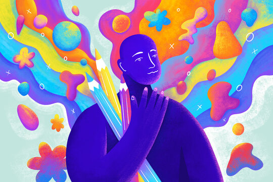 Creative Person holding pencils 