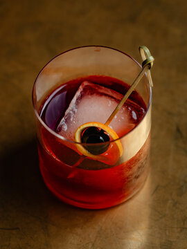 Negroni on a brass table