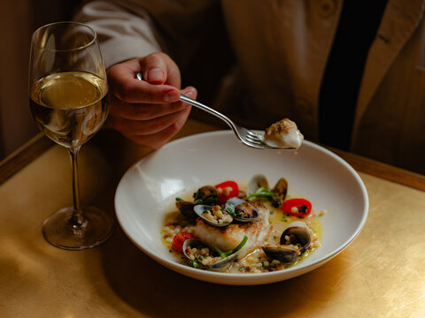 White fish with mussels and cous cous
