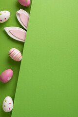 Colorful vertical decorated Easter eggs and playful bunny ears peek from a vibrant green paper...