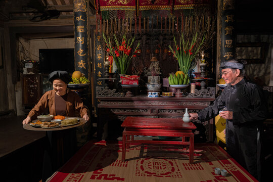 Family Preparing Tet Feast
