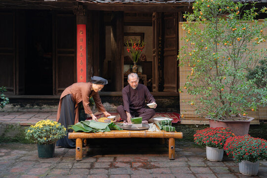 Wrapping Chung Cake for Lunar New Year