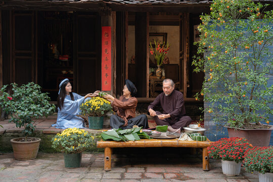 Family Making Banh Chung Together