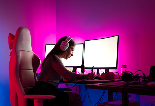 Content creator working at modern gaming desk