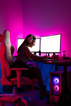 Relaxed content creator at modern gaming setup