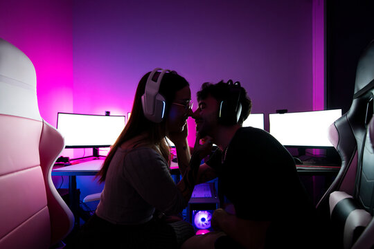 Romantic gamers kiss