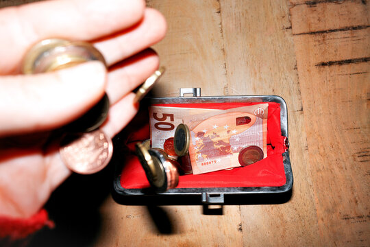 Money, Euro. Hand Holds Coins Wallet With Cash Inside