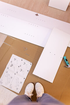 UGC overhead view of furniture pieces ready to assemble