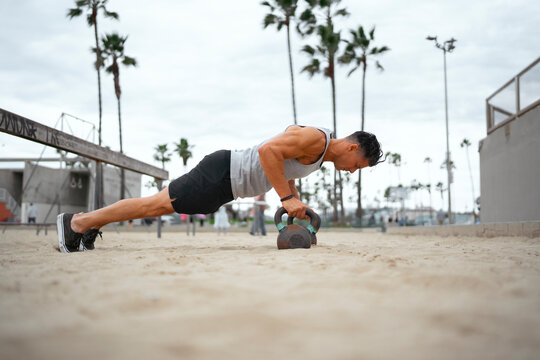 Person working out on the beach

