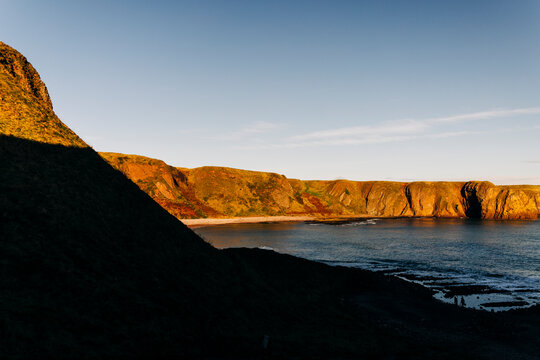 Shadows and light over Scottish sea cliffs