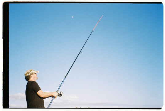 Man Fishing, Clear Sky
