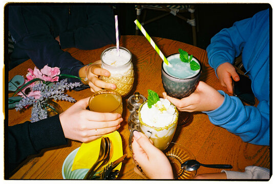 Family Enjoying Colorful Drinks