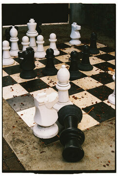Outdoor chess board with oversized pieces