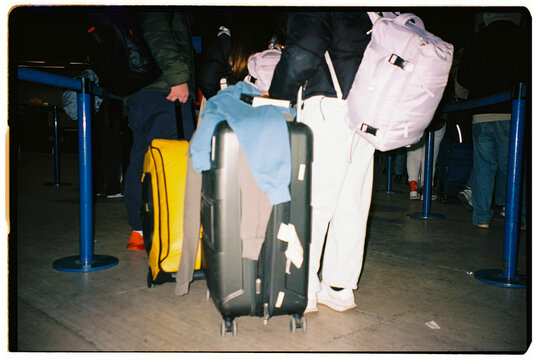 Unfocussed Airport Queue Luggage
