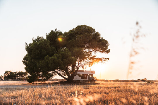 expedition vehicle parked at sunset in greek countryside