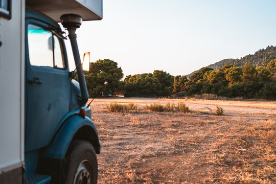 overland truck parked in open mediterranean landscape