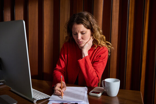 Woman filling up the paperwork