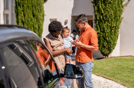 Family enjoying quality time together outside home