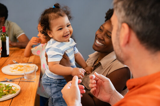 Family enjoying quality time around a dining table