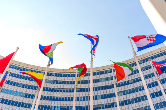 Vienna, Austria - February 26, 2026: Low Angle View of UN Flags in Vienna Austria