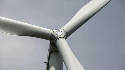 Wind turbine blades turning capturing renewable wind energy © Michael