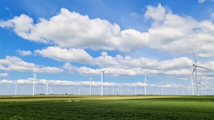 Wind turbines generating clean energy in German windpark
