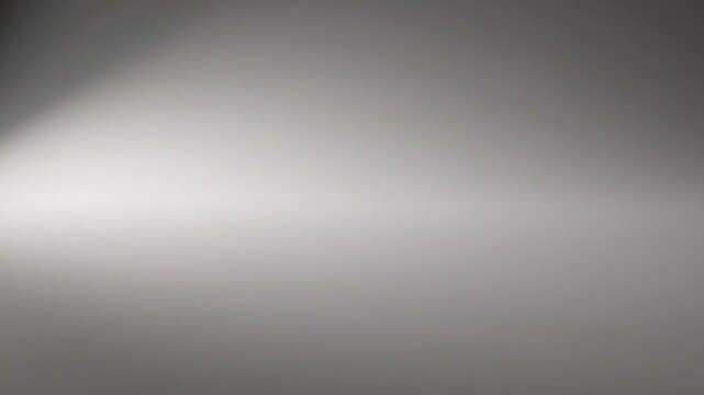 Gray Background with White Spotlight Beam.
