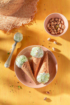 Homemade and tasty pistachio ice cream as a summer dessert.