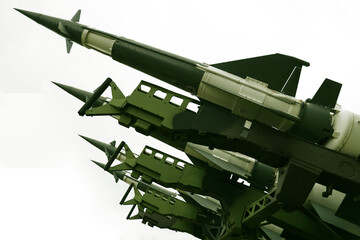 Obraz premium missile with a warhead isolated on white background. Weapons of mass destruction, chemical, nuclear. artillery set of rocket bomb rocket to launch. Missiles with warheads. War, fire, attack, threat