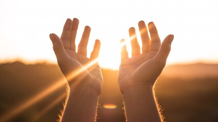 Hands reaching for sunset with fingers spread wide open