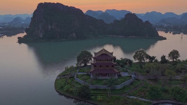 Aerial view of Chua Vang Pagoda, a popular destination for tourists and locals alike, in  Ninh Binh, Vietnam. The pagoda is known for its beautiful architecture.
