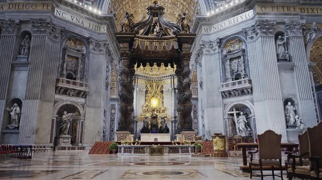 St. Peter's Baldachin in the nave of St. Peter's Basilica. The Baldachin is a large Baroque sculpted canopy positioned over the high altar, directly under the main dome.