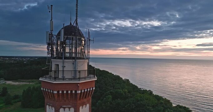 Beautiful Rewal Lighthouse at Sunset in Poland.