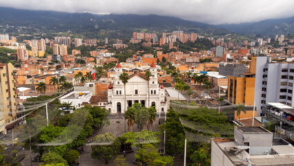 Naklejka premium Envigado, Antioquia - Colombia. February 8, 2026. Aerial drone view. Municipality with 246,327 inhabitants.