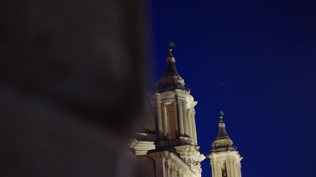 Church Sant' Agnese in Agone, Piazza Navona, Rome, Italy at night on blue hour with stars on dark sky, establishing shot